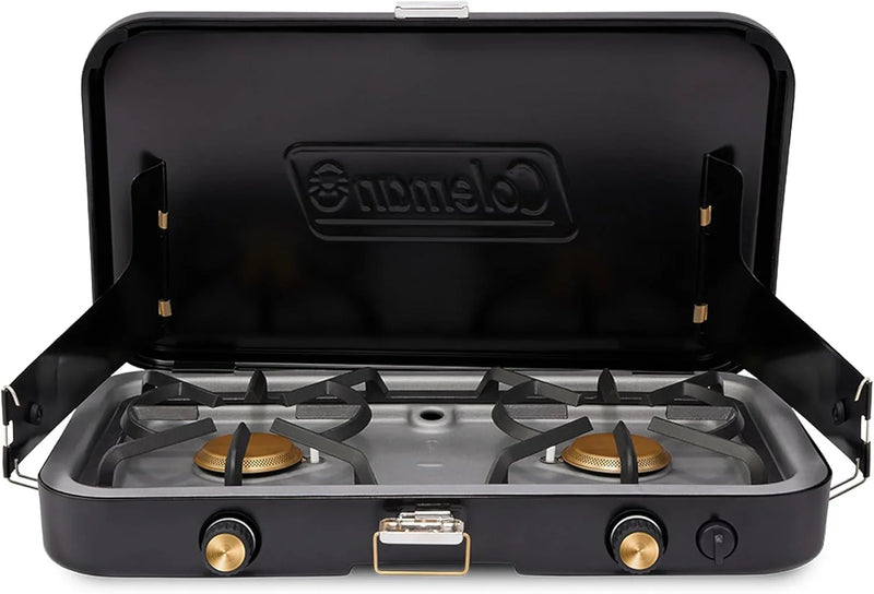 The 1900 series three-in-one propane camping stove, featuring a cast iron grill and frying pan accessories, has a power output of 24000 watts. It is equipped with an adjustable flame cover and excellent lighting device, and comes with two adjustable V4